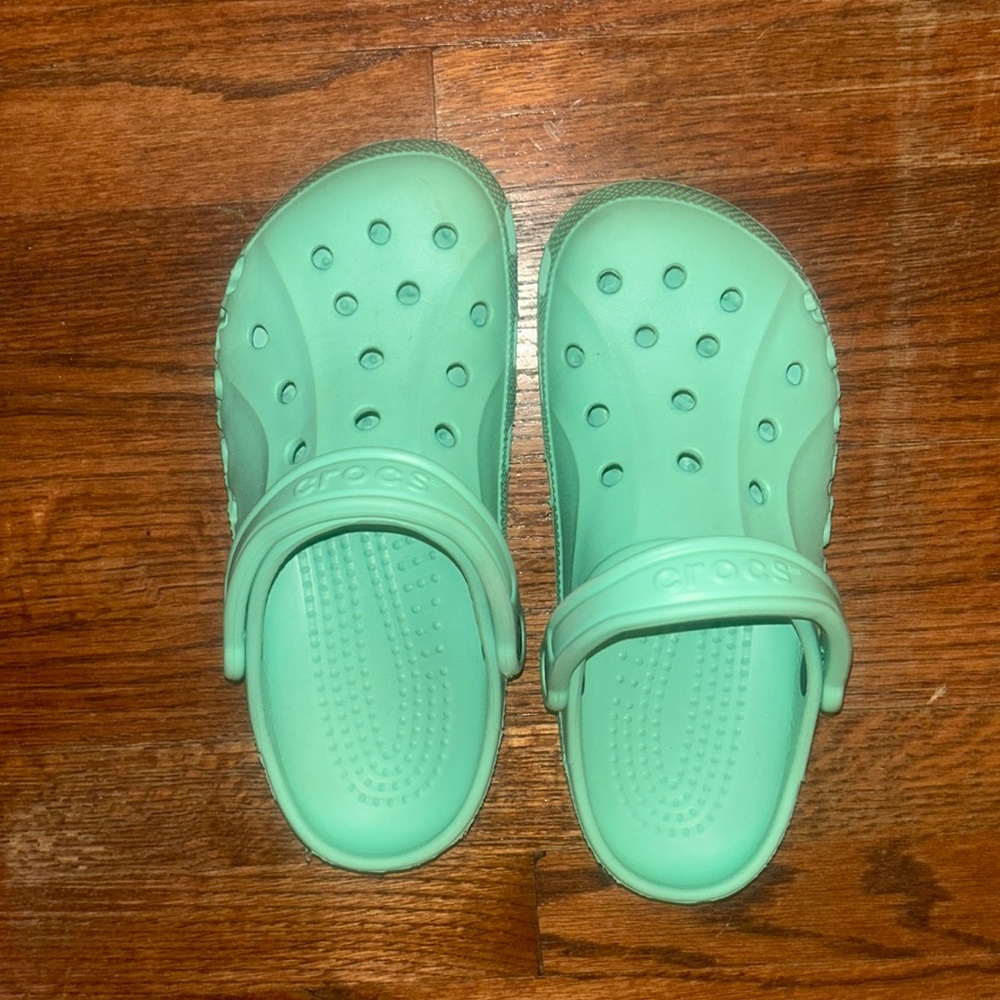 Mint colored crocs